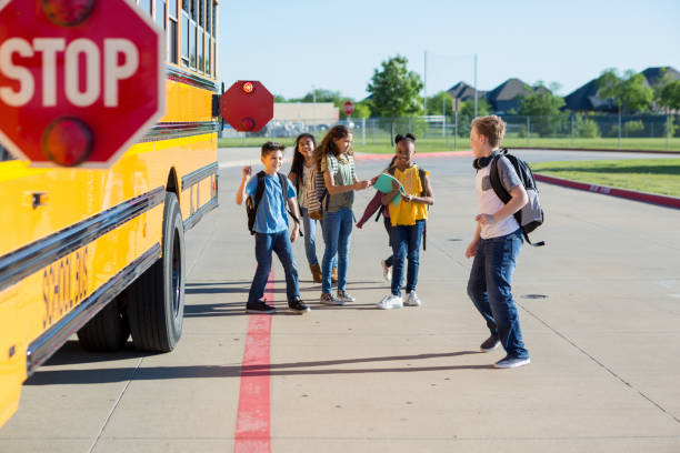 istock Students are safe as they get off bus 1152655159