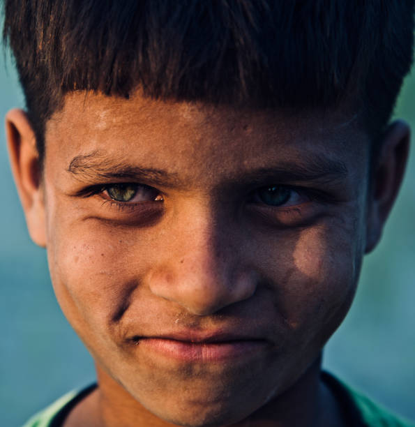 istock Young boy smiling isolated unique portraits photo 1152655330
