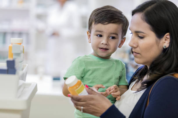 istock Young mother reads labels on medication 1152655454