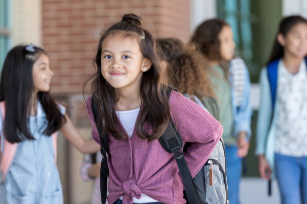 istock Confident female student smiles at the camera 1152655627