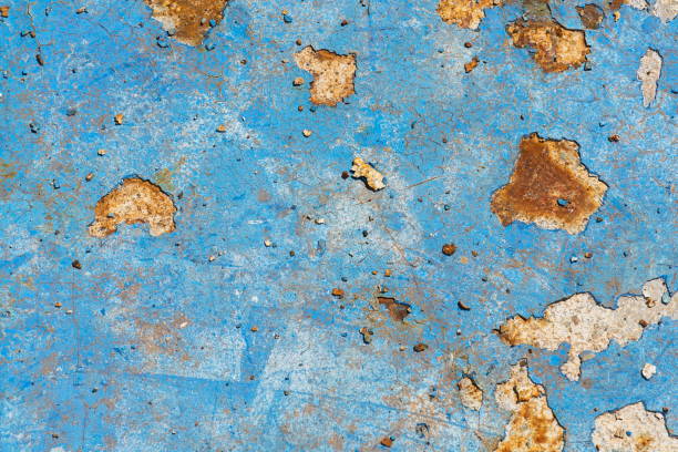 istock Light blue rusty vintage paint background, color on old pool bottom, brown, yellow, decay texture, autumn concept 1152655670