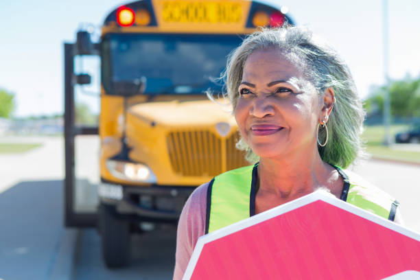 istock A confident female crossing guard waits for students 1152656377