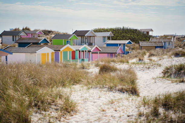 istock Colorful beach huts with clouds in background. Falsterbo, sweden 1152658728