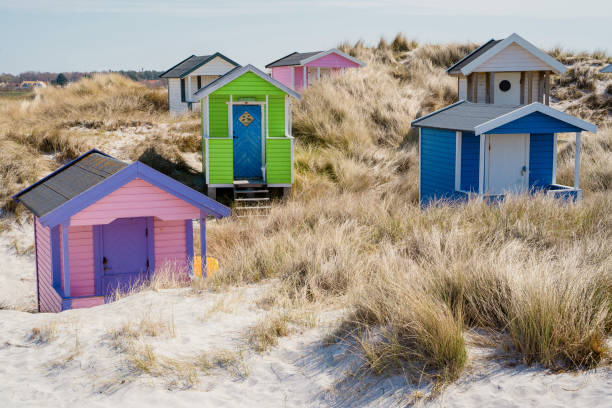 istock Colorful beach huts with clouds in background. Falsterbo, sweden 1152658736