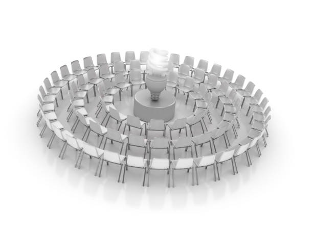 istock Circle of Chairs with Light Bulb - 3D Rendering 1152658850