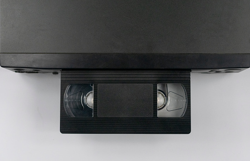 the videotape is inserted into the video recorder top view