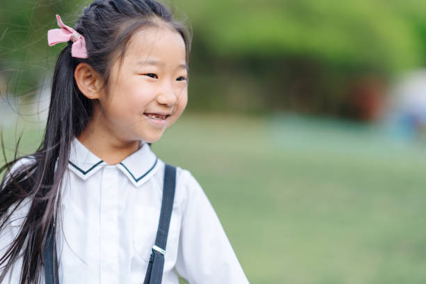 istock Portrait of elementary school girl 1152664072