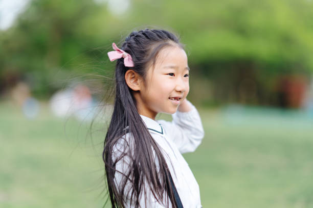 istock Portrait of elementary school girl 1152664103