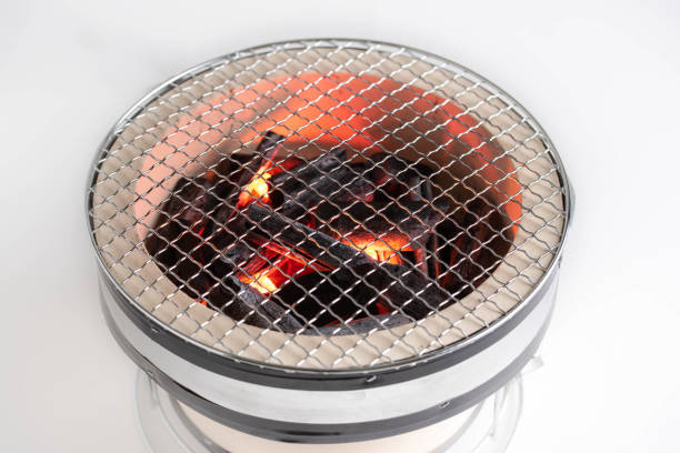 istock japanese grill with burning charcoal closeup 1152664548