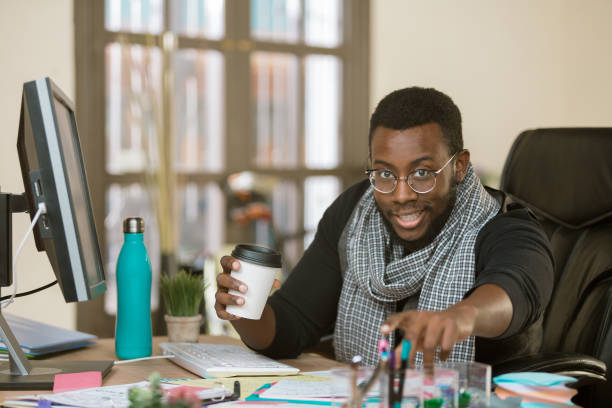 istock Handsome Creative Business Man in an Office 1152670921