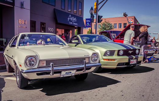 Moncton, New Brunswick, Canada - July 7, 2017 : 1971 Ford Pinto & 2005 Mustang GT convertible parked in the downtown area of Moncton during 2017 Atlantic Nationals Automotive Extravaganza.