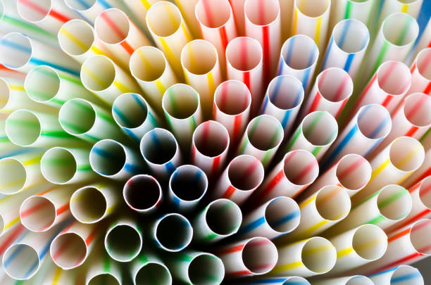 istock Colorful plastic cocktail tubes close-up 1152680324