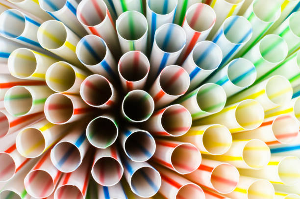 istock Colorful plastic cocktail tubes close-up 1152680325