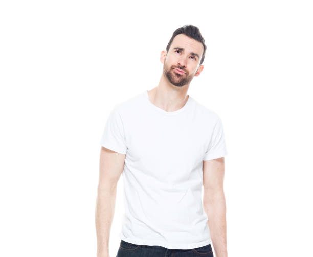 istock Handsome man in white shirt and jeans 1152680806