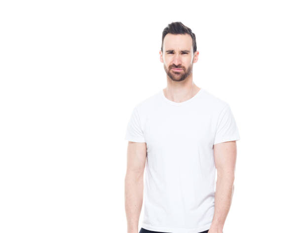 istock Handsome man in white shirt and jeans 1152680866