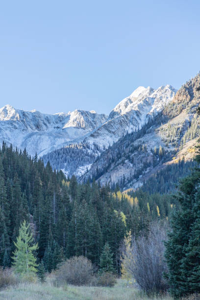 istock Snowy Mountain Peaks Sunrise 1152684164