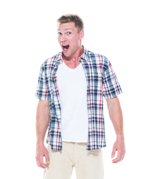 istock Handsome man in shirt and shorts is surprised 1152684736