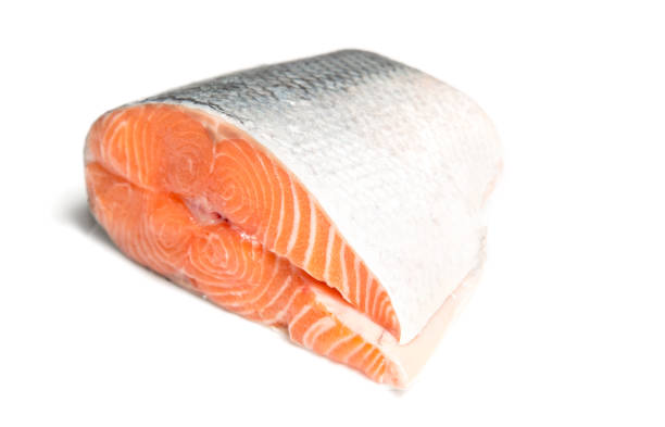 istock Big slice of fresh salmon. 1152684809