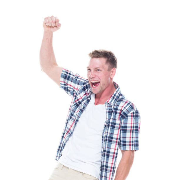 istock Handsome man in shirt and shorts is cheering with hands up 1152684824