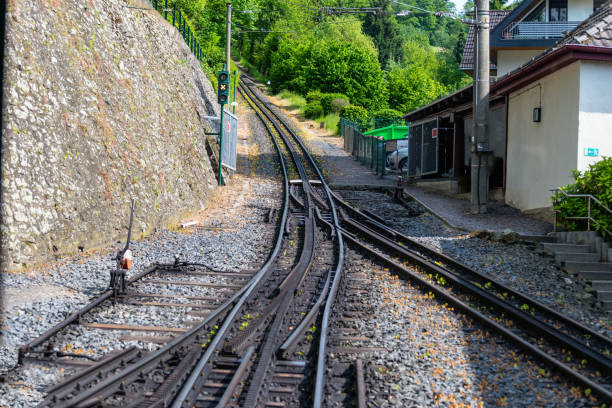 cog railway tracks with an additional toothed rack located in the middle of the track to overcome large tilts. - rack railway imagens e fotografias de stock