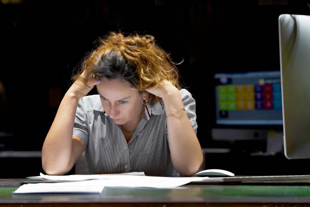 istock Woman in stress in front of computer 1152692301