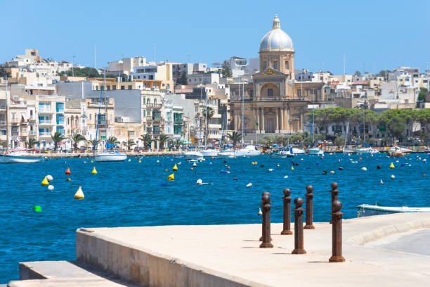 St Joseph's Church Malta Msida Il-Kalkara view from the bay with boats. St Joseph's Church Malta Msida Il-Kalkara view from the bay with boats saint joseph stock pictures, royalty-free photos & images