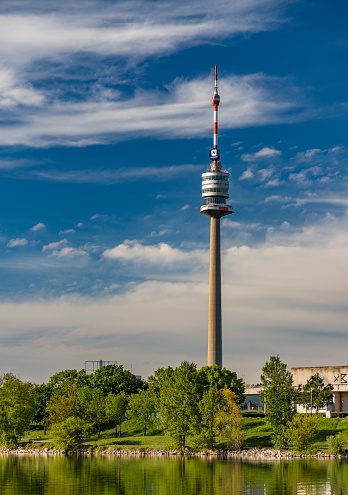 A picture of the Danube Tower taken from the island across it.