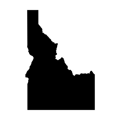 Idaho, state of USA - solid black silhouette map of country area. Simple flat vector illustration.