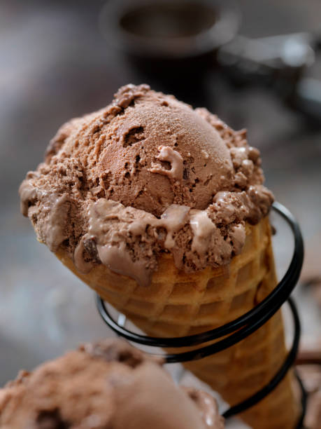istock Double Chocolate Chunk Ice Cream in a Waffle Cone 1152695919
