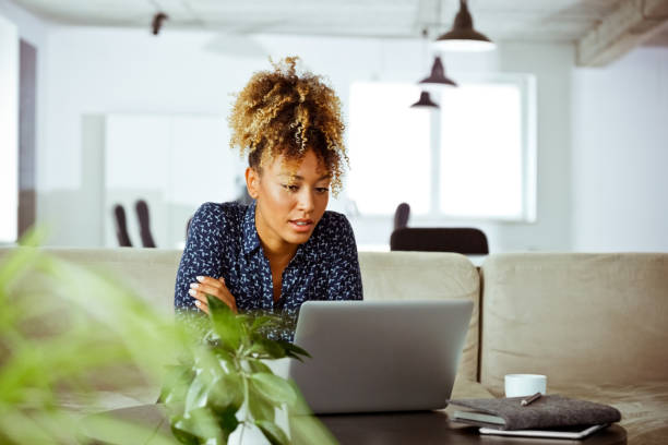 istock Confident financial advisor looking at laptop 1152696161