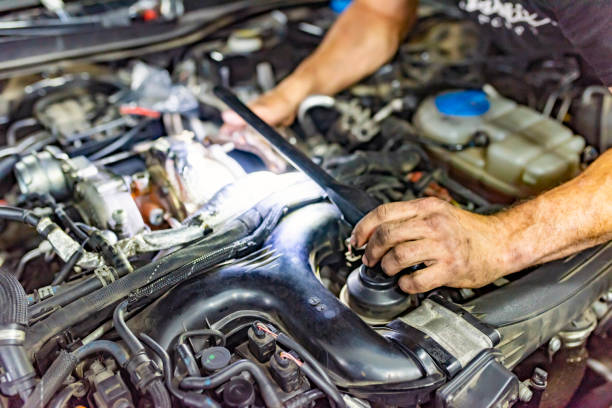 istock Young man hands repairing the engine. 1152700625