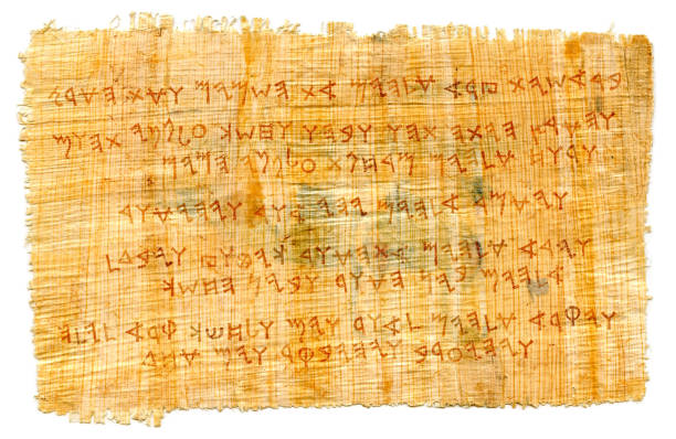 The Ancient Phoenician manuscript. The most first Alphabet in The World, The Middle East, c.1500–1200 B.C. || the text of the First Day of Creation (The Book of Genesis 1:1-5), the consonantal proto-writing [from right to left]. The Ancient Phœnician manuscript. The most first Alphabet in The World, The Middle East, c.1500–1200 B.C. || A sample of the Semitic text of the First Day of Creation (The Book of Genesis 1:1-5), the consonantal proto-writing [from right to left]: «In the beginning God created the heaven and the earth. And the earth was without form, and void; and darkness upon the face of the deep. And God said, Let there be light: and there was light…». — Real Ancient papyrus with applied the Ancient Phœnician Letters, sheet of parchment, Ragged scroll, handmade paper, textured canvas. hieroglyphics photos stock pictures, royalty-free photos & images