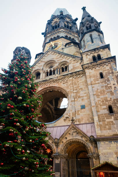 Christmas tree with decorations at Kaiser Wilhelm Memorial Church Berlin Christmas tree with decorations at Wilhelm Memorial Church on Christmas market in Berlin in Germany in Europe in winter. German street Xmas and holiday fair in European city or town. kaiser wilhelm memorial church stock pictures, royalty-free photos & images