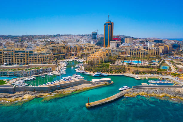 Aerial view of the Marina Bay, Portomaso tower in St. Julians city. Malta island Aerial view of the Marina Bay, Portomaso tower in St. Julians city. Malta island malta stock pictures, royalty-free photos & images