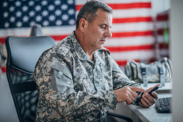 istock An old American soldier works in the office 1152709038