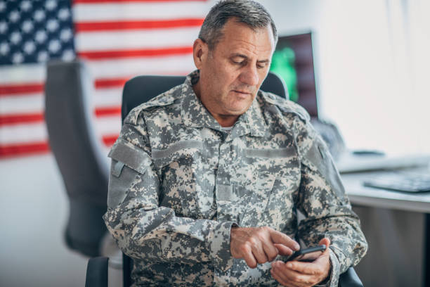 istock An old American soldier works in the office 1152709039