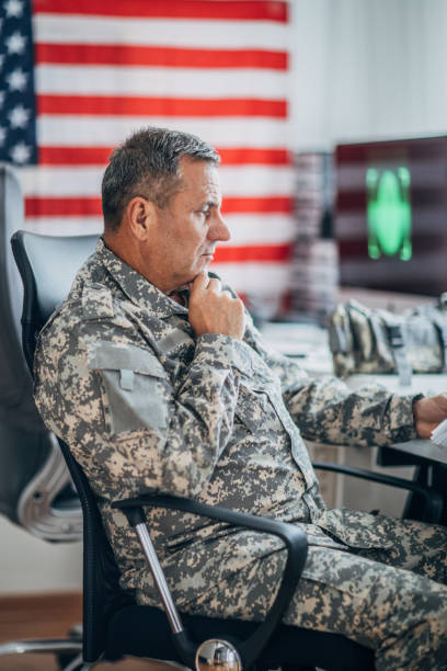 istock An old American soldier works in the office 1152709057