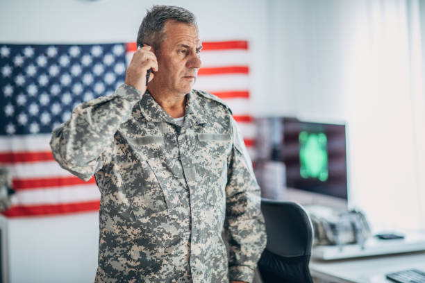 istock An old American soldier works in the office 1152709094