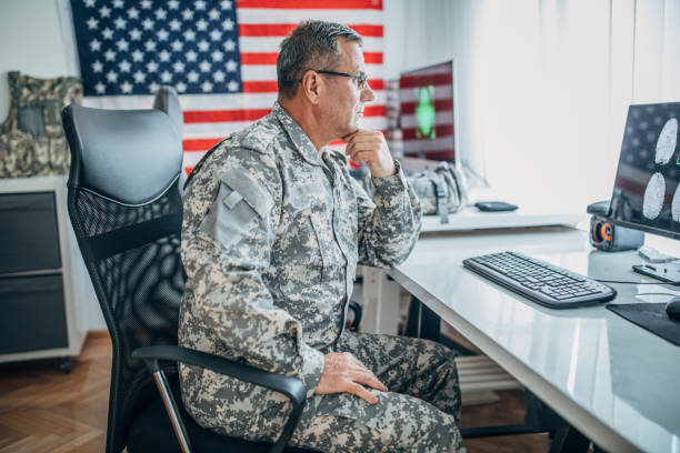 istock An old American soldier works in the office 1152709190