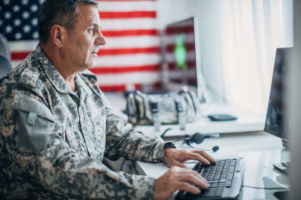 istock An old American soldier works in the office 1152709237