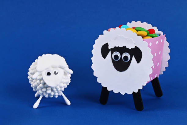istock Diy Eid al adha lamb sheep cotton pads, cotton buds, swabs on blue Gift idea, decor Eid al adha 1152712217