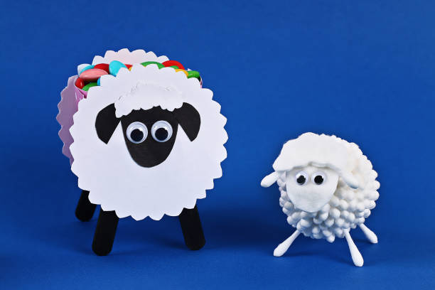 istock Diy Eid al adha lamb sheep cotton pads, cotton buds, swabs on blue Gift idea, decor Eid al adha 1152712219