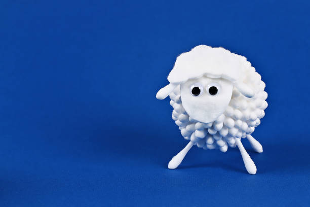 istock Diy Eid al adha lamb sheep cotton pads, cotton buds, swabs on blue Gift idea, decor Eid al adha 1152712221