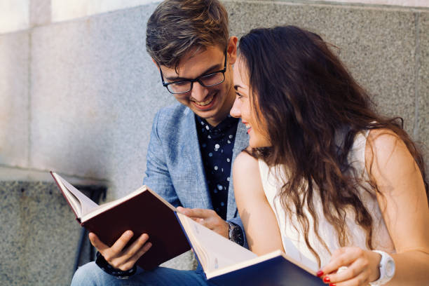 istock Young couple reading books 1152712385