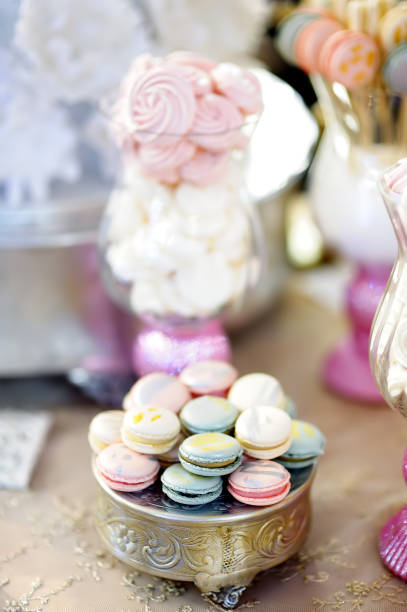 istock Traditional anniversary/wedding sweet table with macaroons. 1152719906
