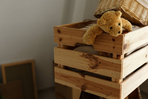 istock Toys and stuff in wooden crate 1152723844
