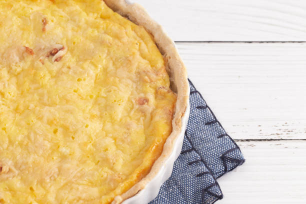 istock Whole Quiche Lorraine on a Wooden Table 1152724993