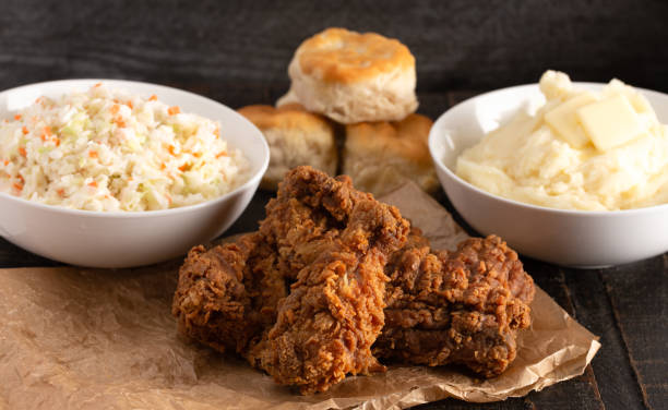 Homestyle Meal of Fried Chicken Mashed Potatoes Coleslaw and Buttermilk Biscuits Homestyle Meal of Fried Chicken Mashed Potatoes Coleslaw and Buttermilk Biscuits biscuit quick bread photos stock pictures, royalty-free photos & images