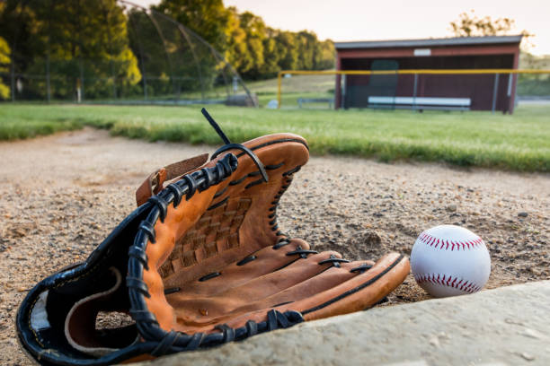istock Baseball and glove on pitchers mound on early morning springtime 1152727853