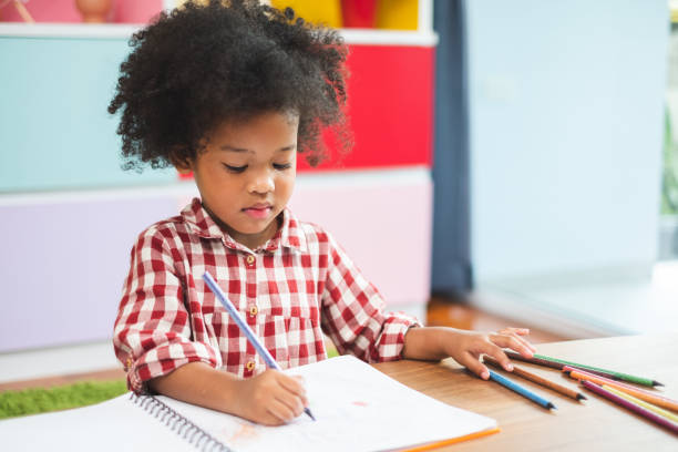 istock African cute kids studying  at home, kids education concept 1152740904